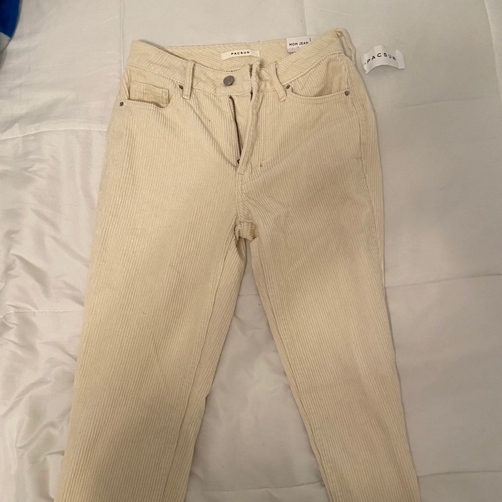 cream mom jeans